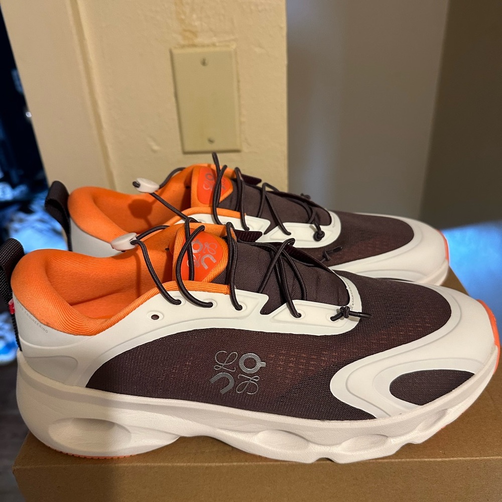 On Running Orange and Brown Sneakers